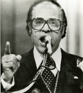 Benjamin Hooks, executive director of the NAACP, calls for blacks to ban together in their efforts to overcome racial injustices during a speech to the 69th annual convention. July 4, 1978